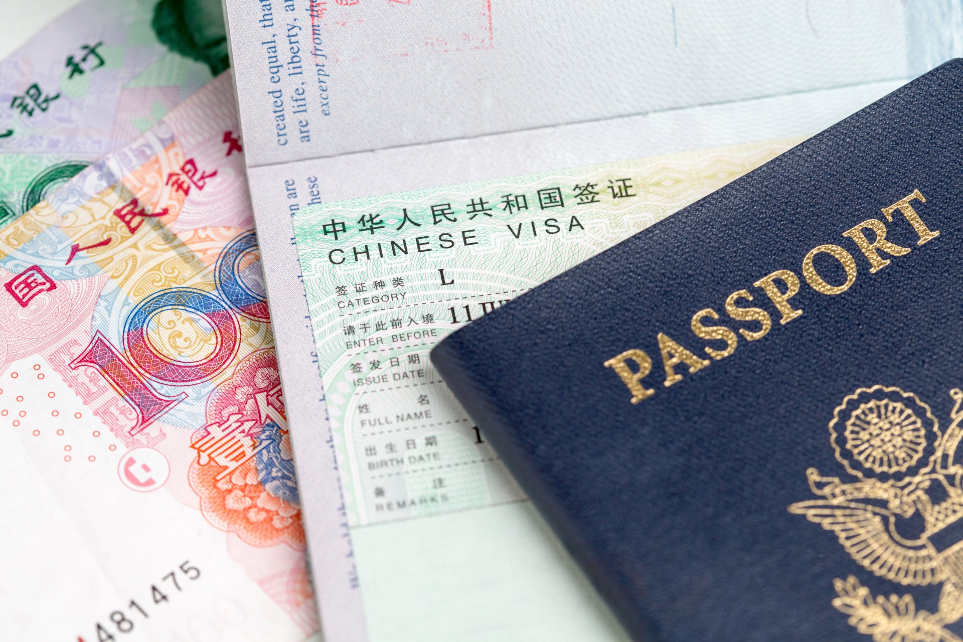 Chinese Visa with Yuan (RMB) and Passport